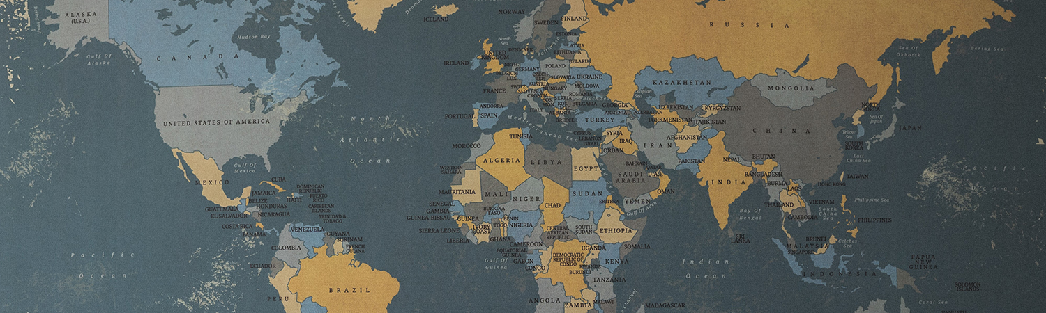 World map in blues and yellows showing all of the country borders