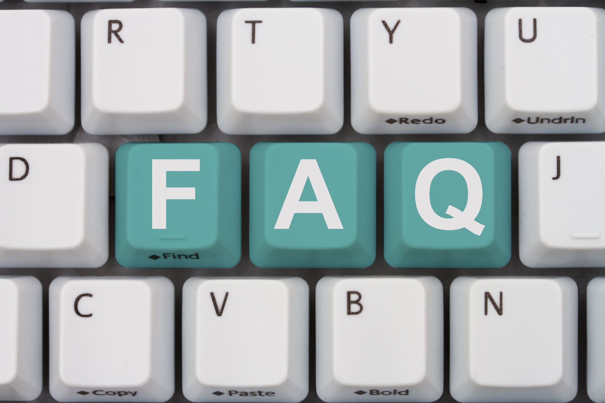 computer keyboard with keys that spell FAQ