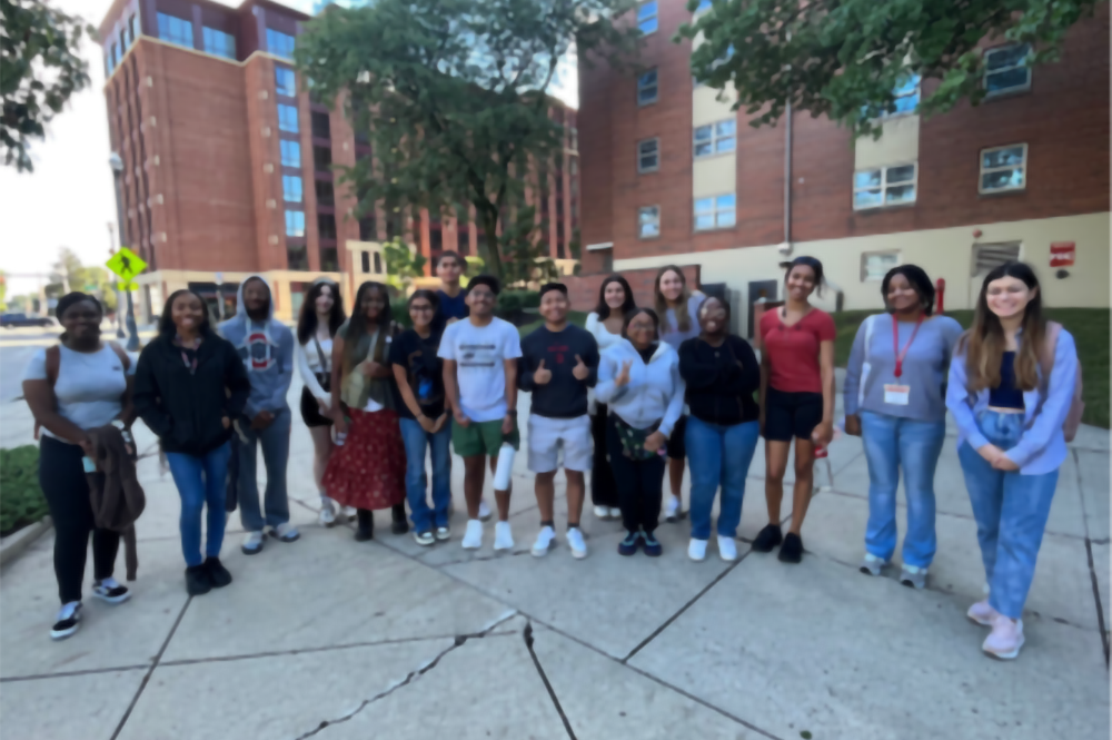 A group of students stand together for a photo