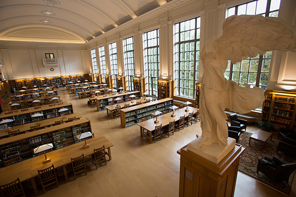 Inside of Thompson library at Ohio State with large tables and windows