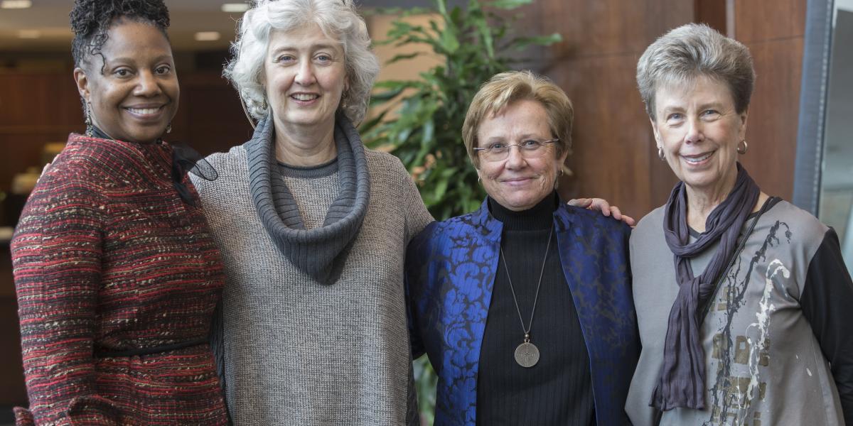 Pictured from left to right, all former directors of The Women’s Place (not pictured, current director, Andreá Williams): Jennifer Beard, Hazel Morrow-Jones, Deborah Ballam and Judy Fountain Yesso.