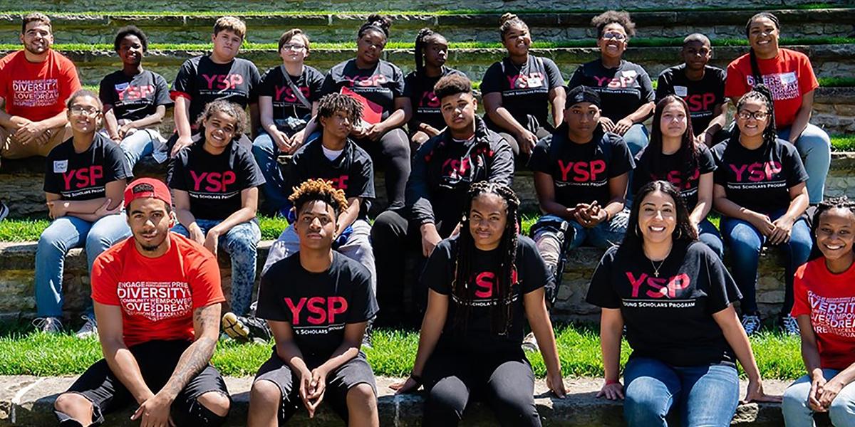 Young Scholars sitting on the Ohio State amphitheater steps