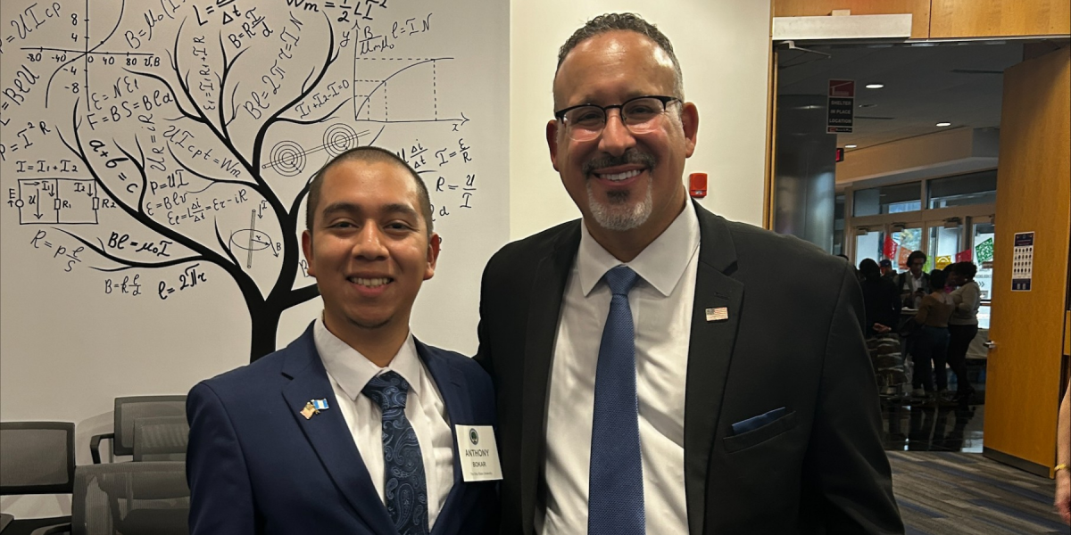 Anthony Bokar with US Secretary of Education Miguel Cardona