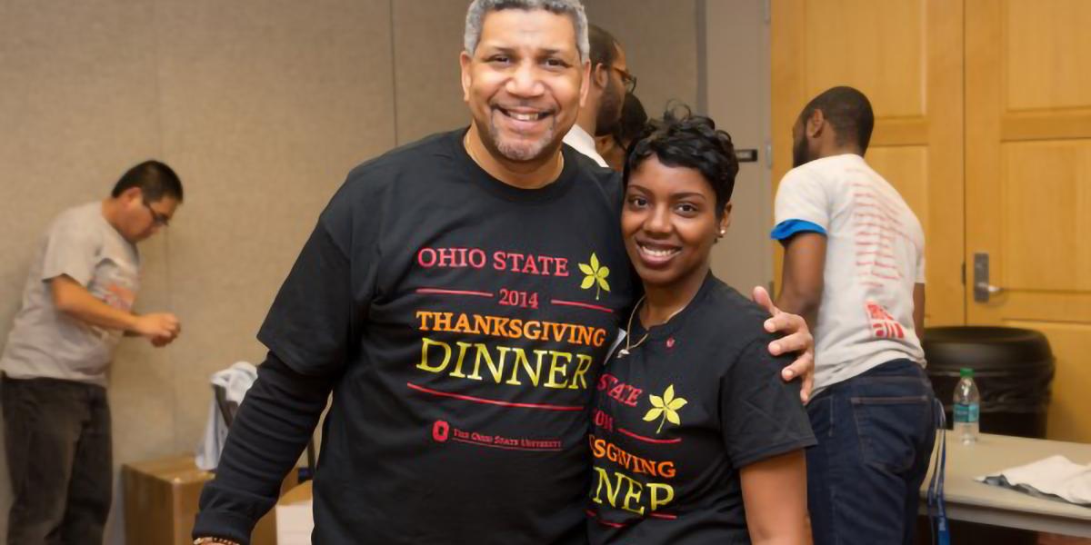 Larry Williamson with a student at Ohio State's Thanksgiving Dinner