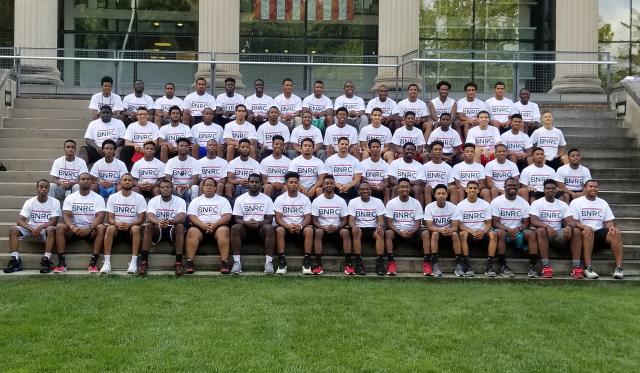 BRNC EAP participants sitting on steps in matching white t-shirts