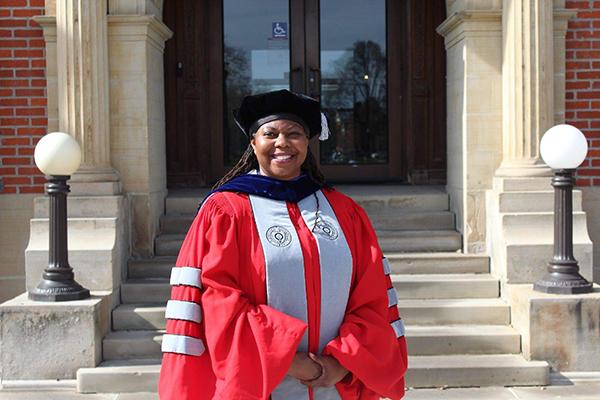 BRNC Bell Fellow in PhD regalia