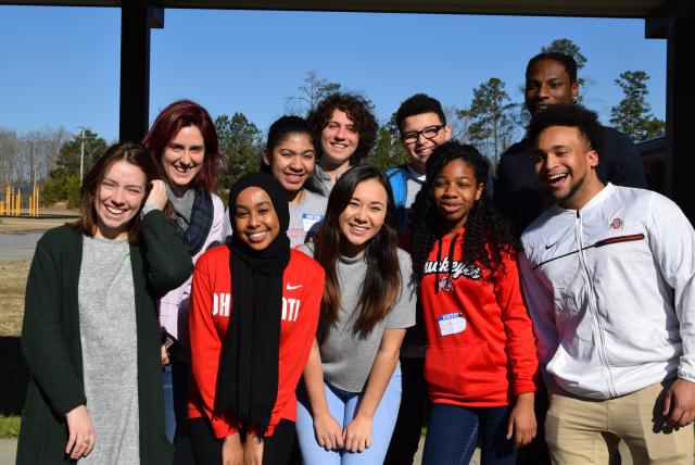 MSP students stand in bright sunshine with Ohio State colors