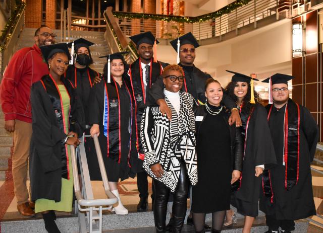 YSP grads in cap and gown in the Ohio Union