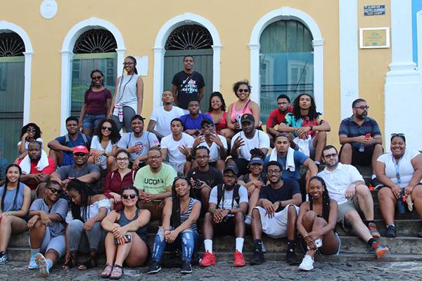 Large group of Ohio State students in front of a yellow building in Brazil 