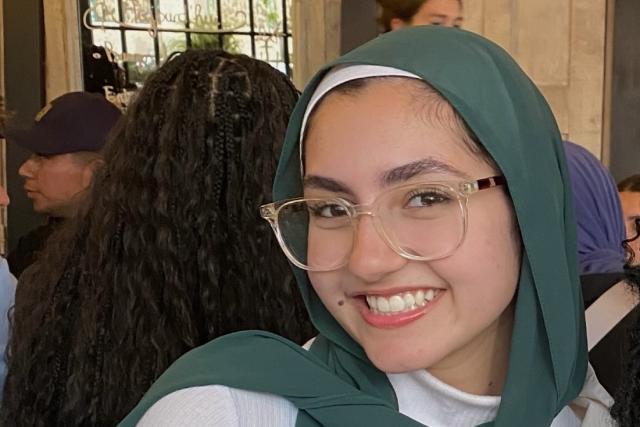 Sarah Al-Hashemi: in headscarf and glasses