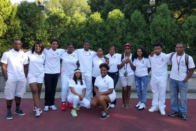 YSP students in  white polos in a greoup photo