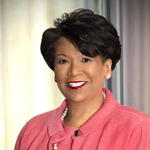 Judge Yvette McGee Brown in a salmon pink jacket with pearls