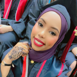 selfie of Sabah Salem in her cap and gown at graduation